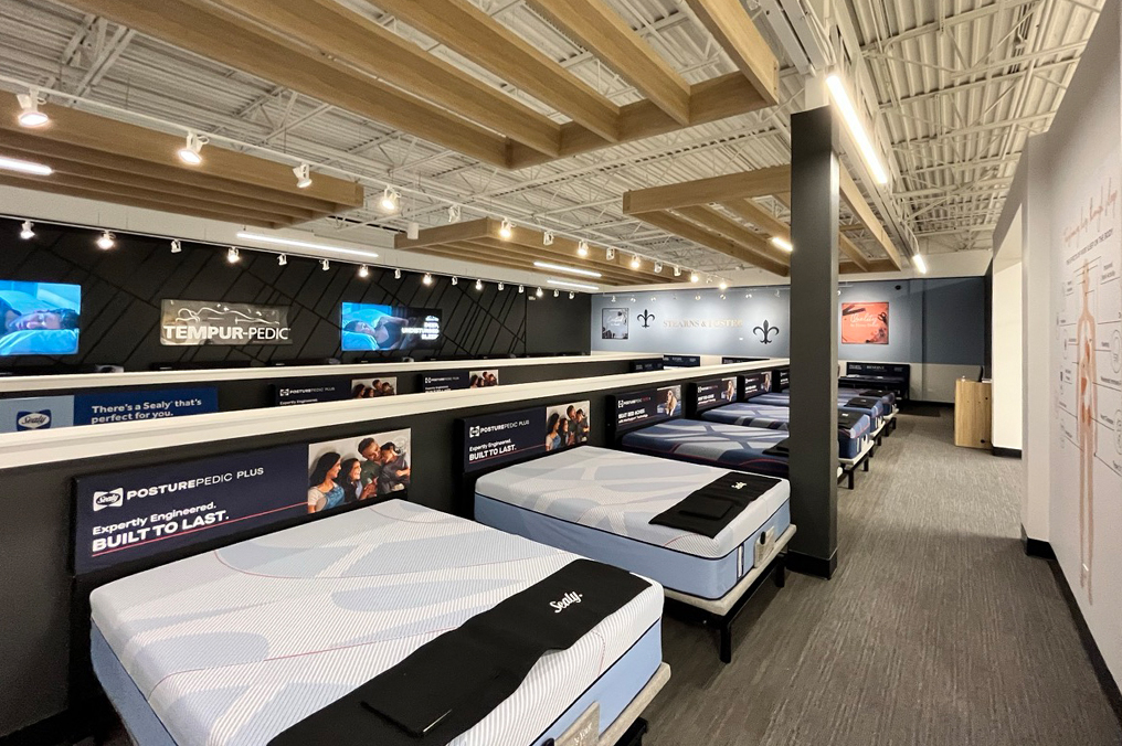 Wood beam panels on ceiling inside interior renovation project at Ashley Furniture Homestore in Chicagoland