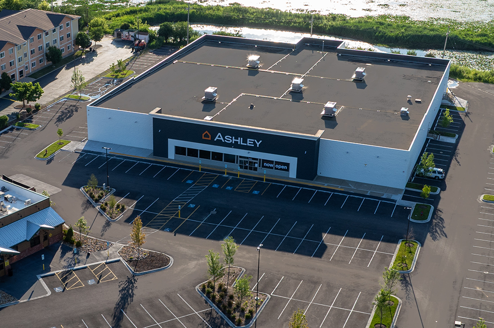 CoreBuilt Construction exterior drone image of Ashley Furniture Homestore retail shop located in Gurnee, Illinois